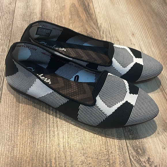 Skechers Shoes - Chic Black and White Women's Slip-On Shoes